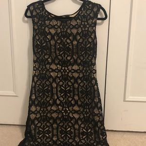 Black lace dress with nude slip underneath
